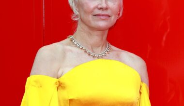 Pamela Anderson Rocks Backless Dress With Extra-High Slit in NYC