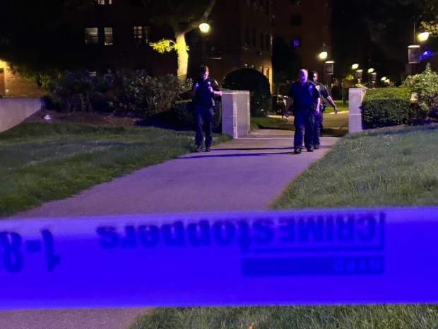 Police are on the scene after a 14-year-old was shot and killed in the courtyard of the Ocean Bay Houses in Far Rockaway, Queens, on September 21, 2026.