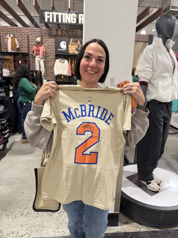 Knicks fan Debbie Tavares attends a meet-and-greet with Knicks guard Miles McBride on Friday. (Kristian Winfield/New York Daily News)