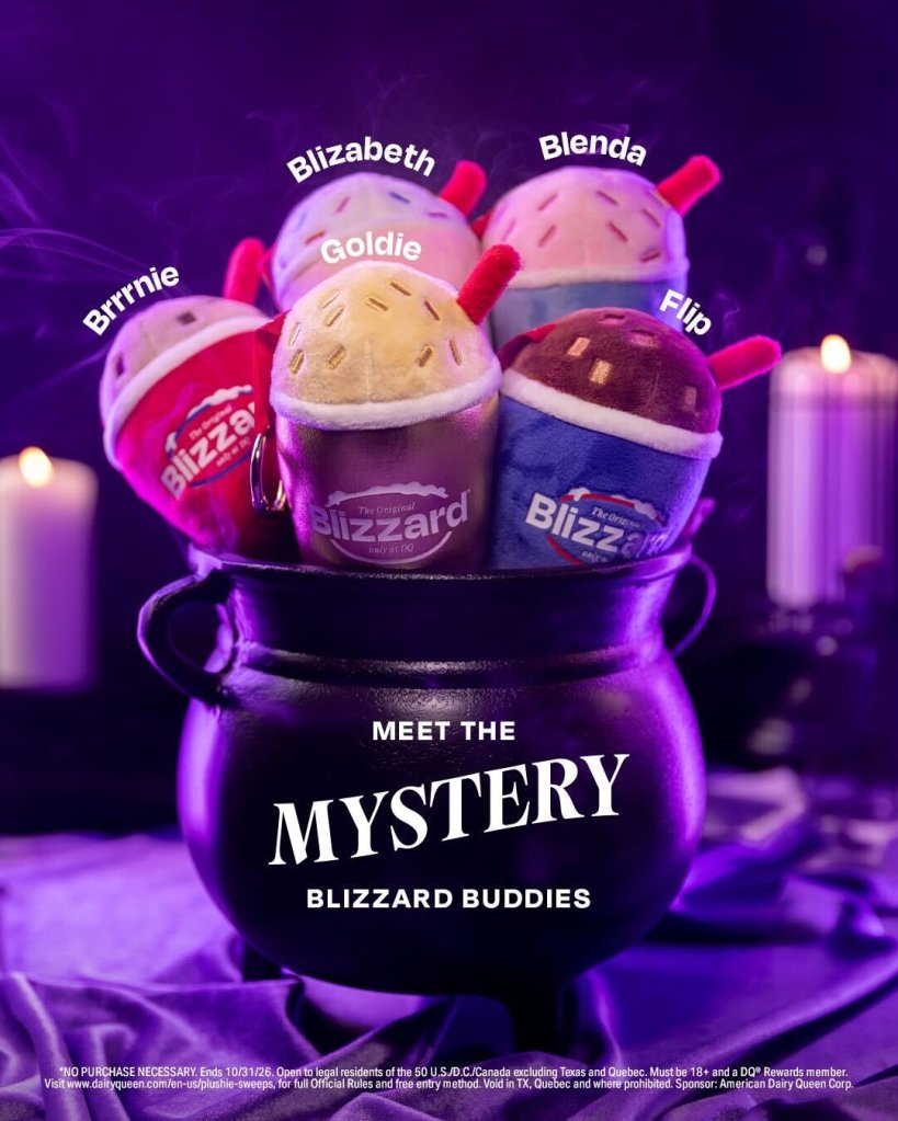 Five "Blizzard Buddy" plush keychains, resembling mini Dairy Queen Blizzard treats, in a black cauldron.