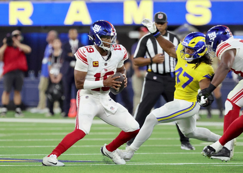 New York Giants quarterback Jameis Winston (19) forced out of the pocket as Los Angeles Rams linebacker Wesley Bailey (47) rushes.