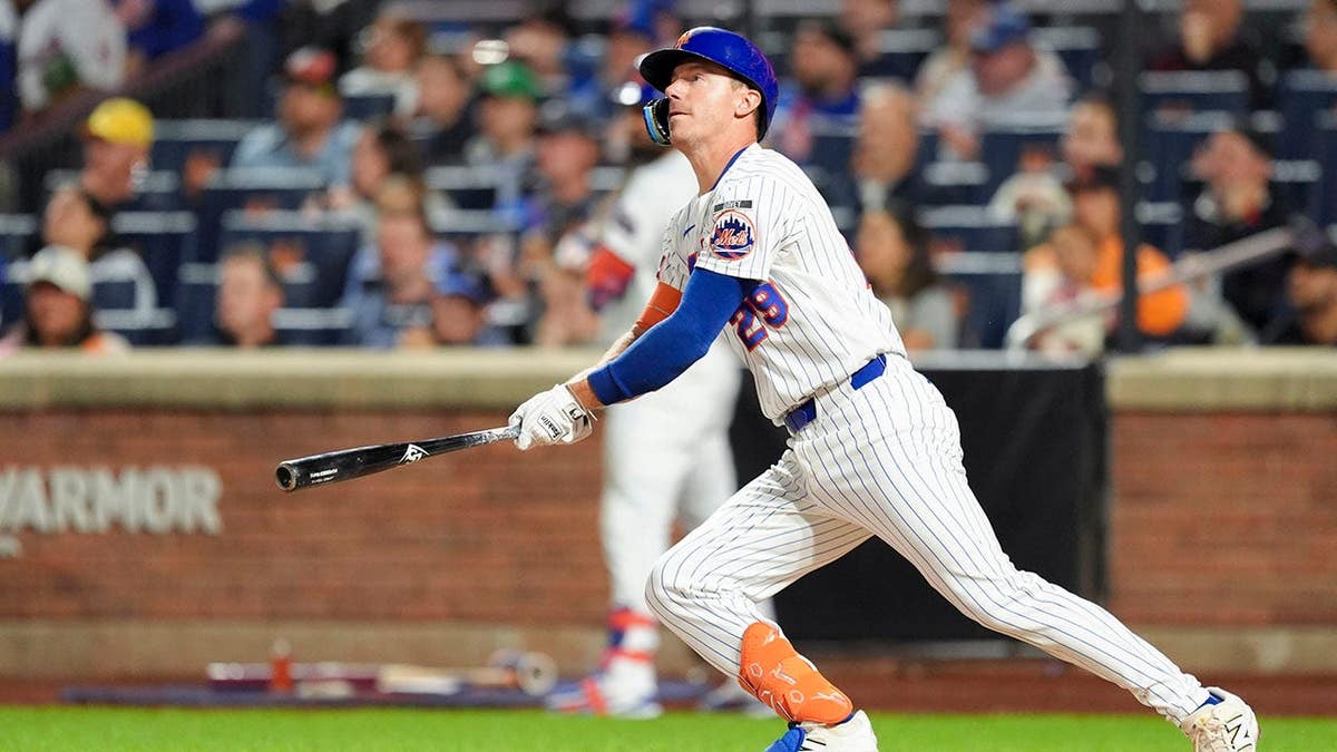 Jared Young swings at Citi Field during a Mets game.