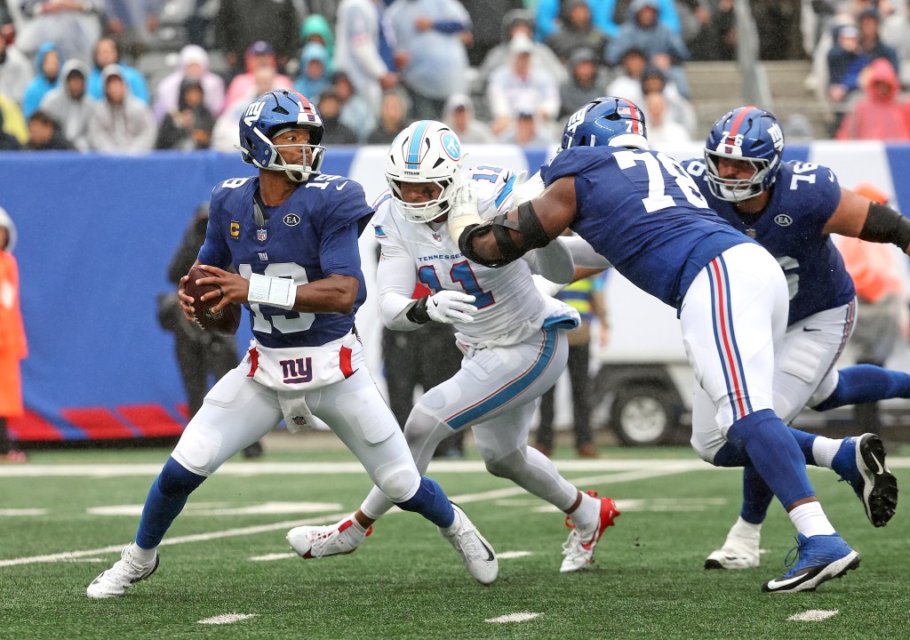 New York Giants quarterback Jameis Winston (19) looks to pass as offensive tackle Andrew Thomas (78) blocks Tennessee Titans defensive end Jermaine Johnson II (11).