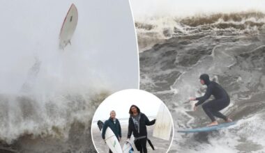 Surfers ignore nor’easter warnings and dangers, catch high waves off Rockaway Beach