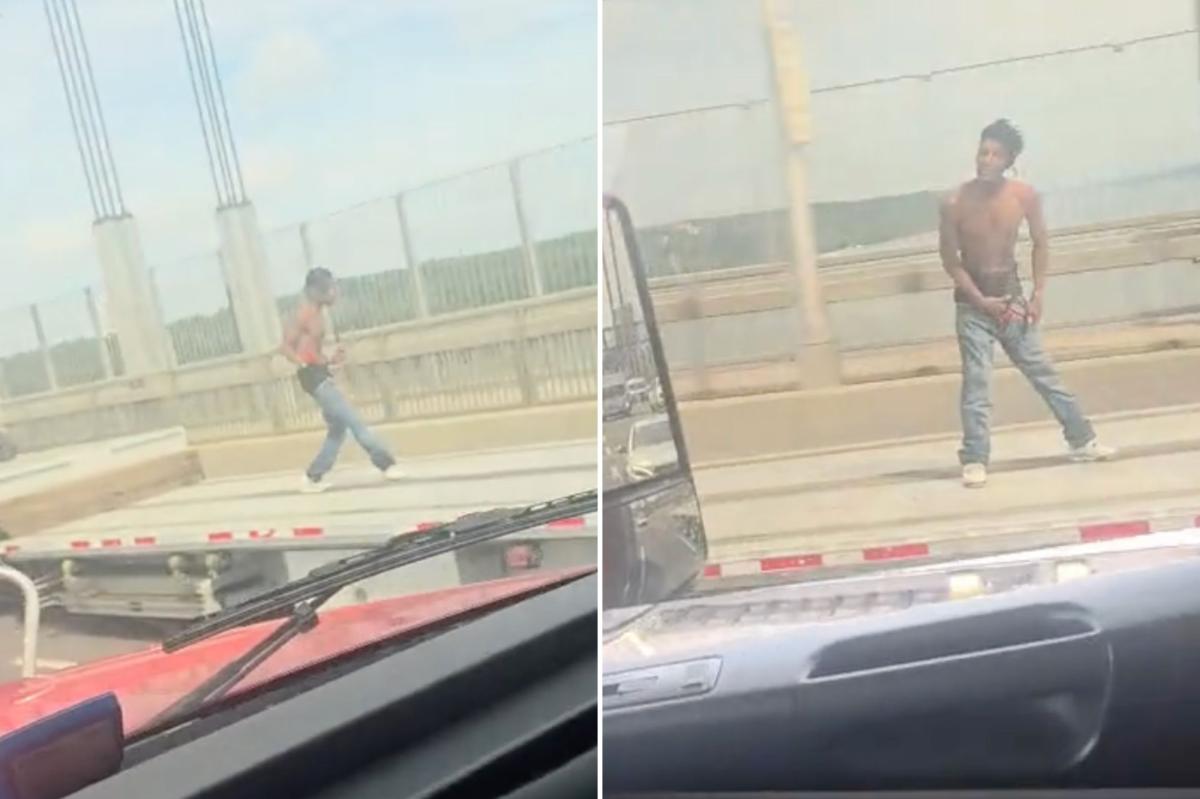 NYC daredevil Arnesia Crawford dances on flatbed truck over George Washington Bridge