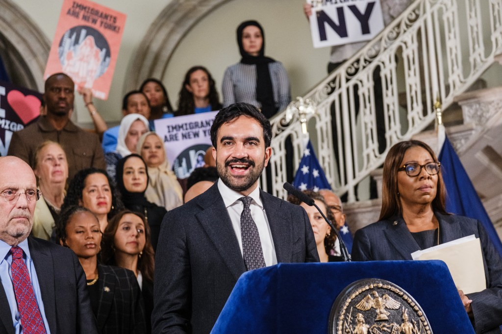 New York City Mayor Zohran Mamdani speaking at a press conference next to Attorney General Letitia James.