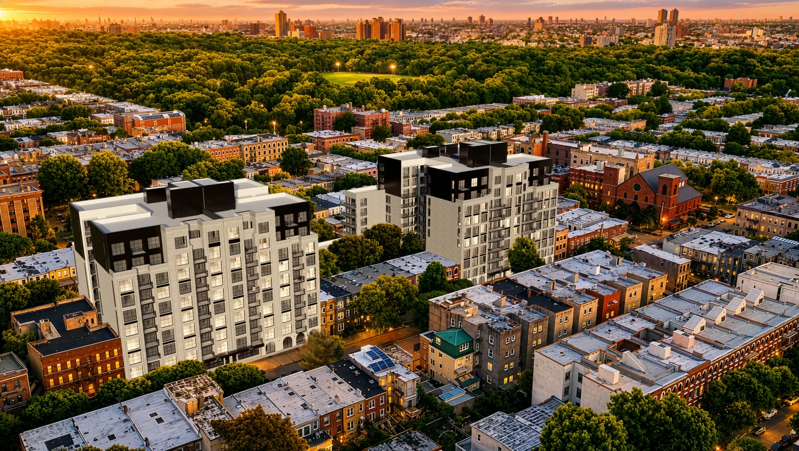 aerial view of tall, multi-story residential buildings amidst lower scale buildings