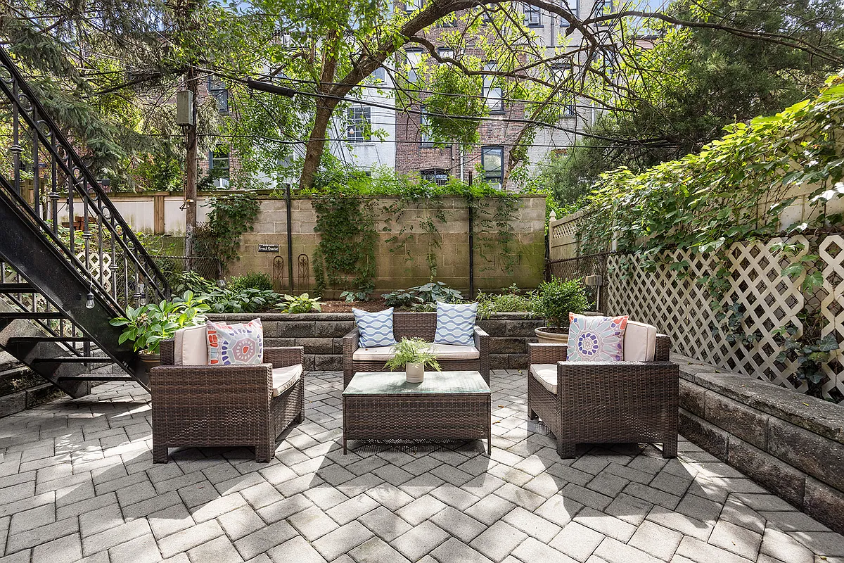 virtually staged garden with patio, raised bed