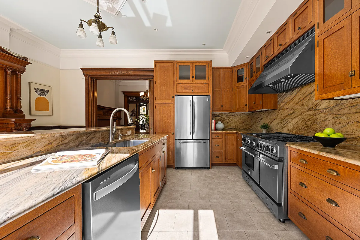 kitchen with wood cabinets, tile floor