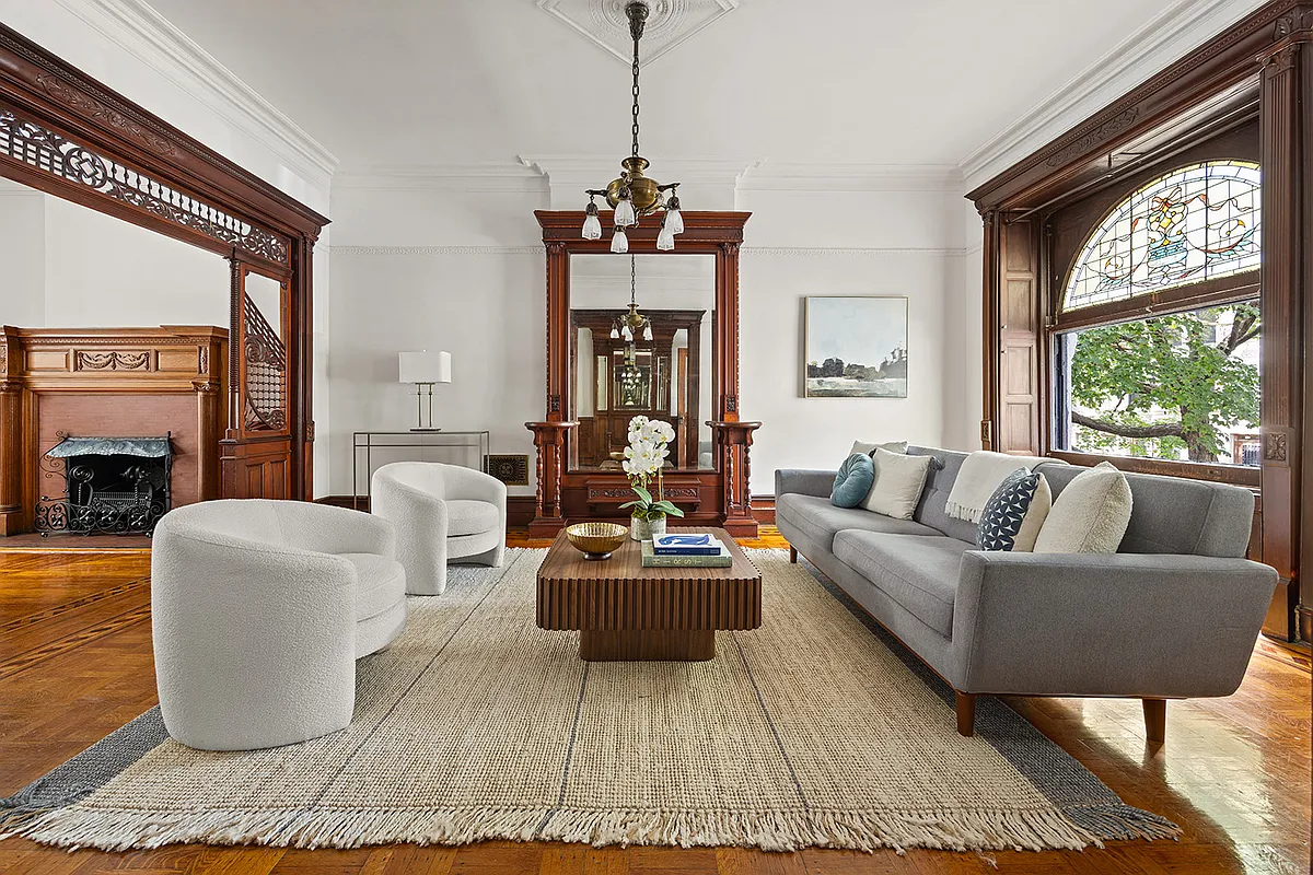 staged parlor with pier mirror, stained glass, woodwork