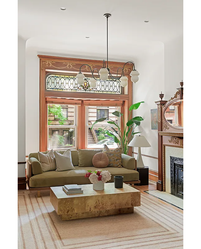 parlor with stained glass transom window