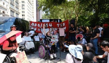 Raine Reilly speaks at a protest outside City Hall to end 24-hour shifts for home care workers in New York City.