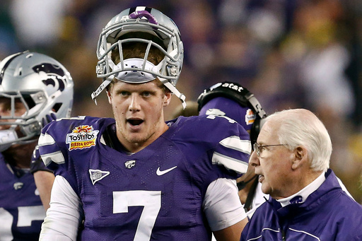 FILE - Kansas State head coach Bill Snyder, right, talks with quarterback Collin Klein (7) during the first half in the Fiesta Bowl NCAA college football game against Oregon, Jan. 3, 2013, in Glendale, Ariz. (AP Photo/Ross D. Franklin, File)