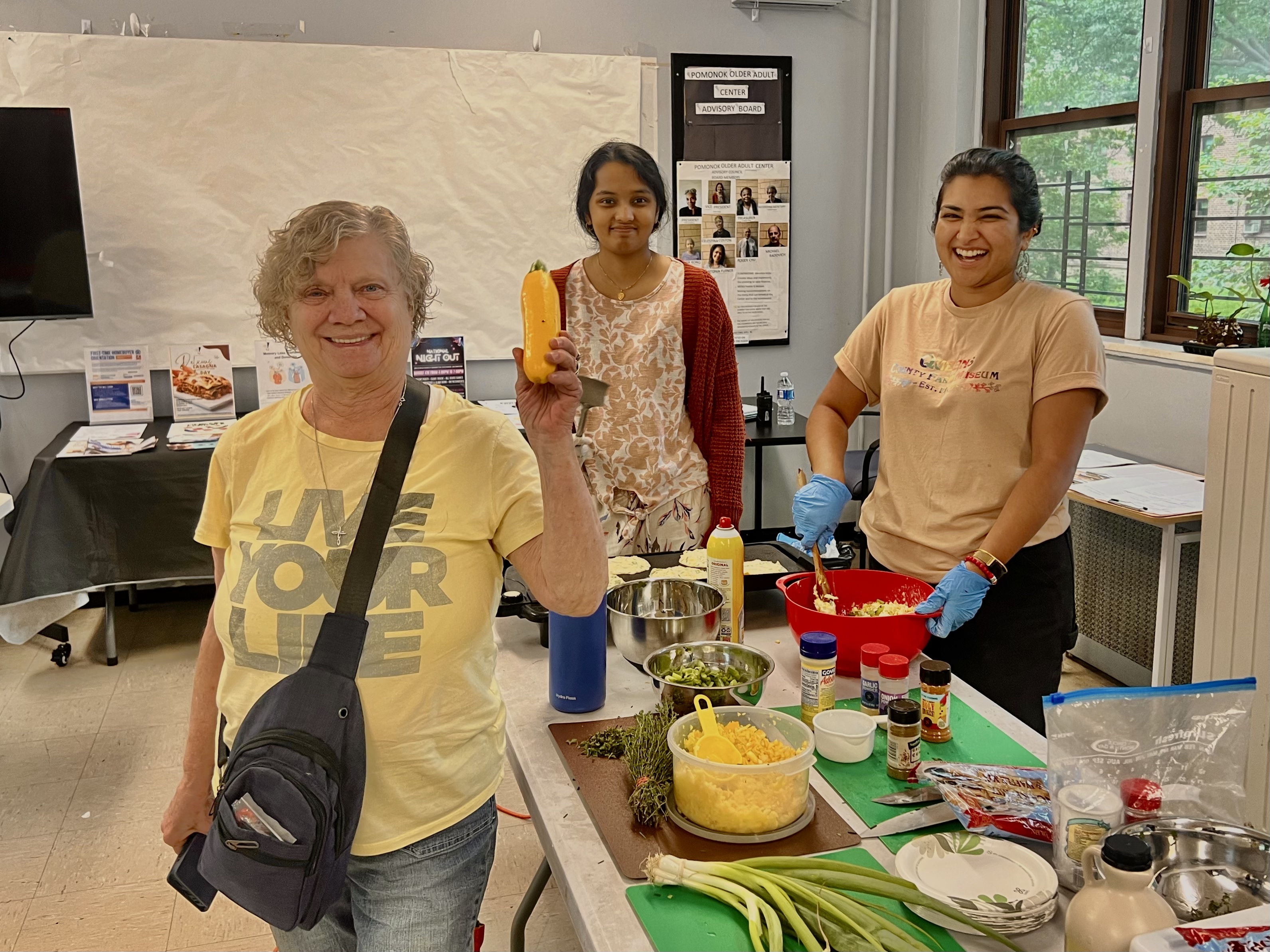 Queens County Farm Museum and Queens Community House (QCH) have partnered to bring locally grown produce directly to Pomonok residents through a weekly community food access market at QCH’s Pomonok Community Center. 