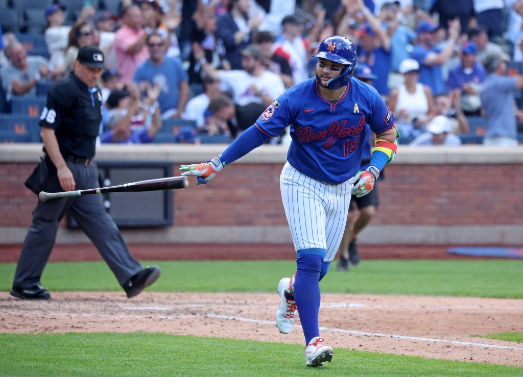 New York Mets third baseman Bo Bichette (19) reacts after hitting a three-run home run.