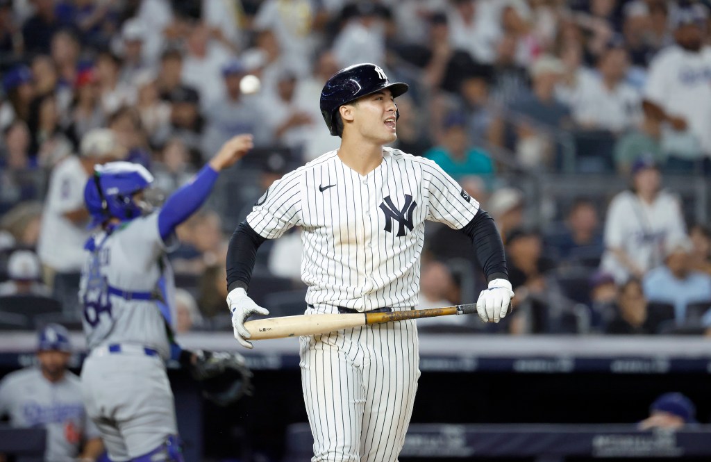 Anthony Volpe of the New York Yankees reacts after striking out against the Los Angeles Dodgers.