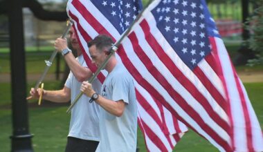 Runners carrying American flags from Boston to NYC to "reclaim the route" of 9/11 flights