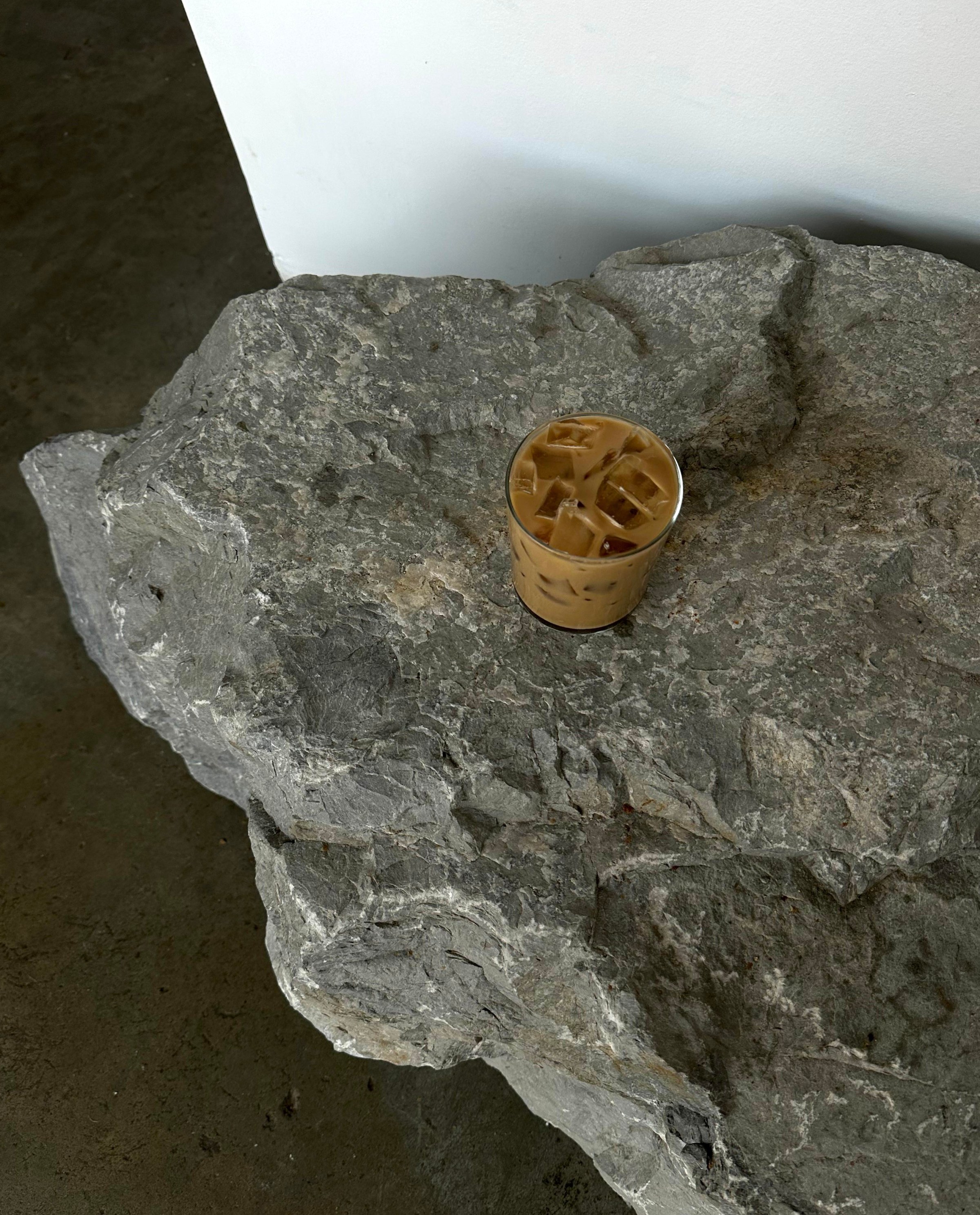 At the NYC cafe chain, Rhythm Zero, rocks add an element of surprise to the space