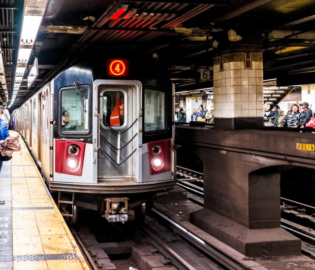 A No. 4 train pulls into a subway station in New York City. (Shutterstock)