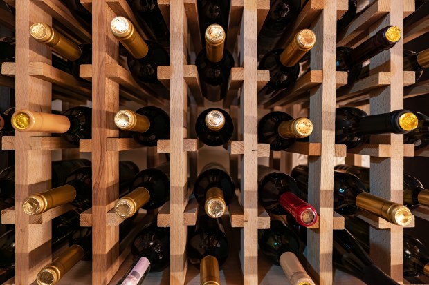 A Ponzi schemer got a six-year prison sentence Thursday for his boozy bamboozle to trick investors into thinking they were giving loans to wine collectors who were putting up their rare bottles as collateral. (Shutterstock)