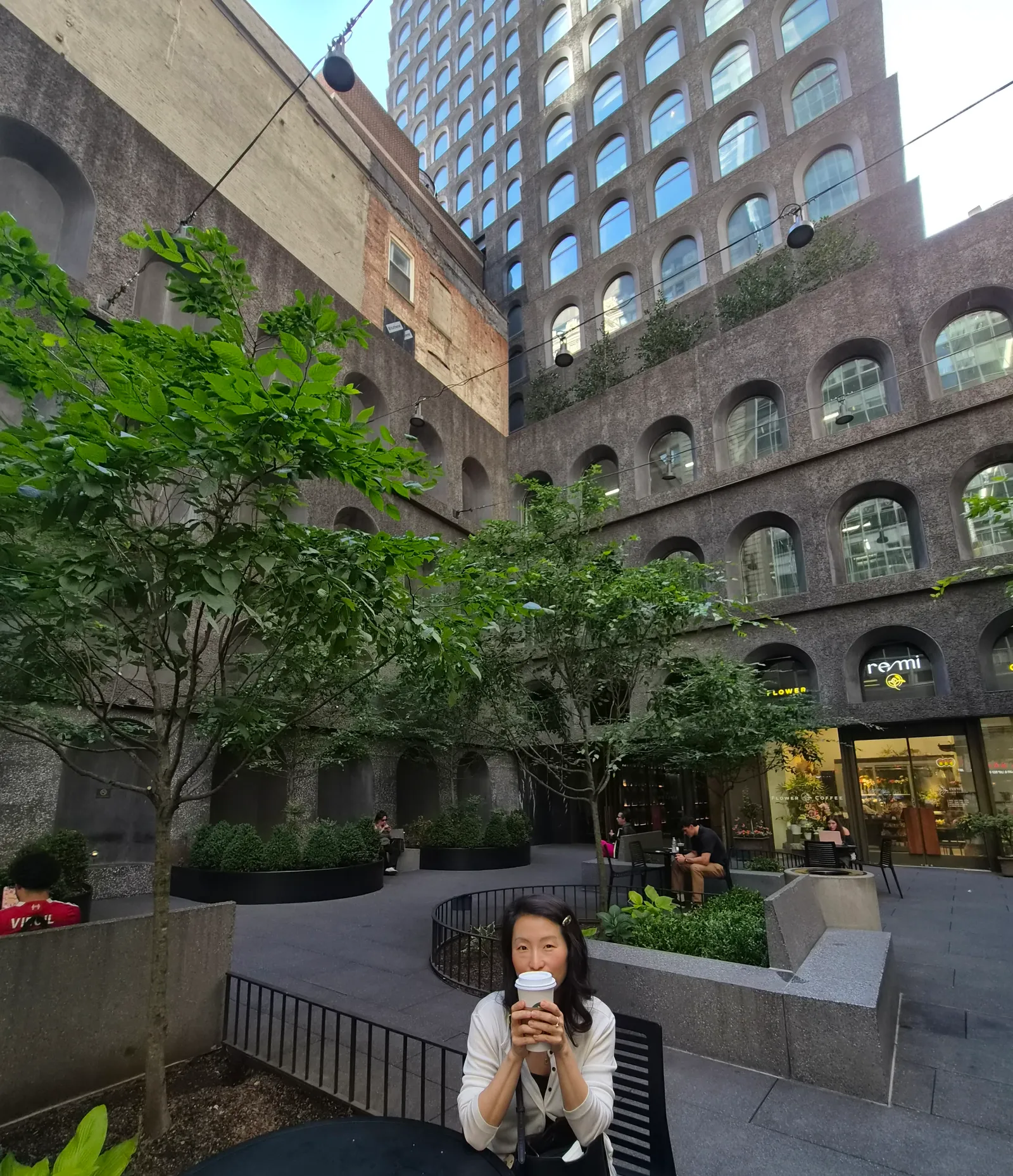 Soo Kim pictured in a public square on William Street in Lower Manhattan.