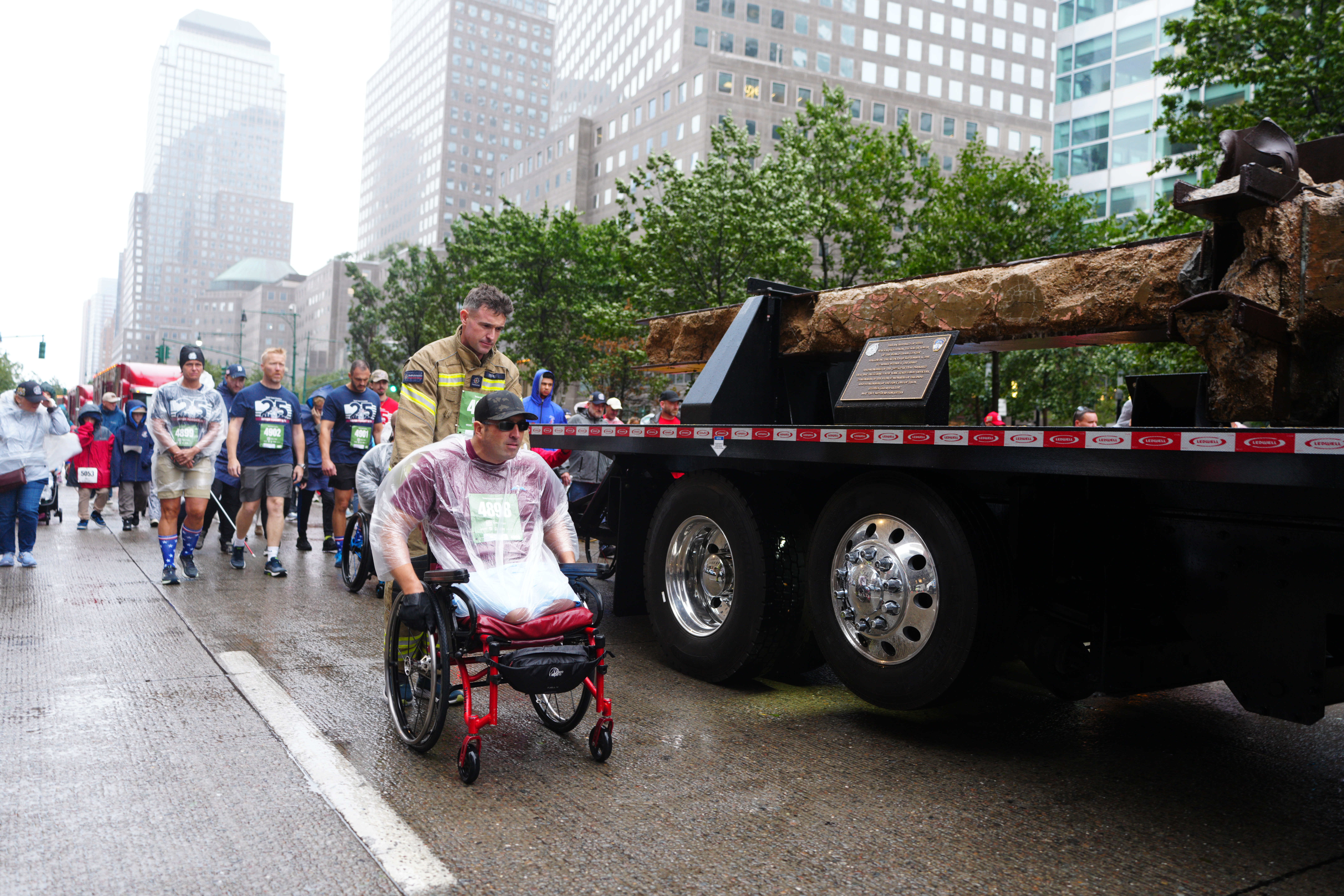 A steel beam from the World Trade Center's South Tower is carried on a truck during the Tunnel to Towers NYC 5K Run & Walk.