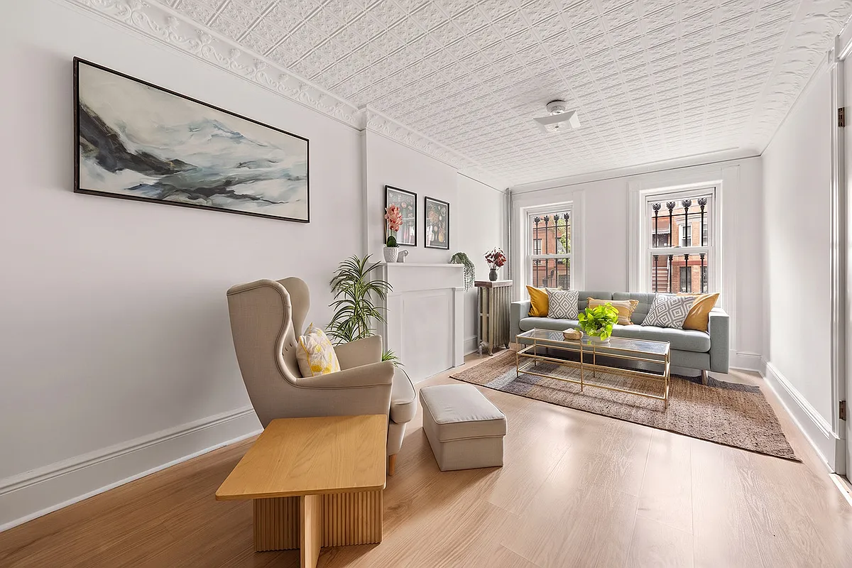 living room with tin ceiling