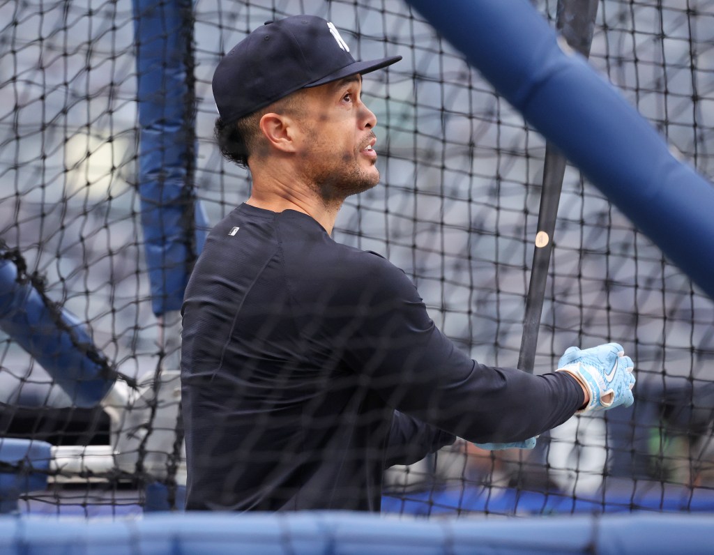 New York Yankees' Giancarlo Stanton (27) takes batting practice before a game against the Tampa Bay Rays at Yankee Stadium in the Bronx, N.Y., Thursday, Sept. 24, 2026.