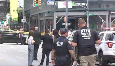 Woman stabs 2 then is fatally shot by police in Times Square