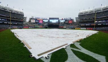 A tarp covers the field during a rain delay at Yankee Stadium in New York. (AP Photo/Seth Wenig)