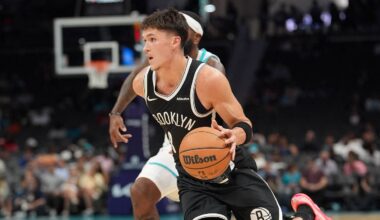 Oct 6, 2026; Charlotte, North Carolina, USA;  Brooklyn Nets guard Egor Demin (8) drives to the basket against the Charlotte Hornets during the second quarter at Spectrum Center.  Mandatory Credit: Jim Dedmon-Imagn Images