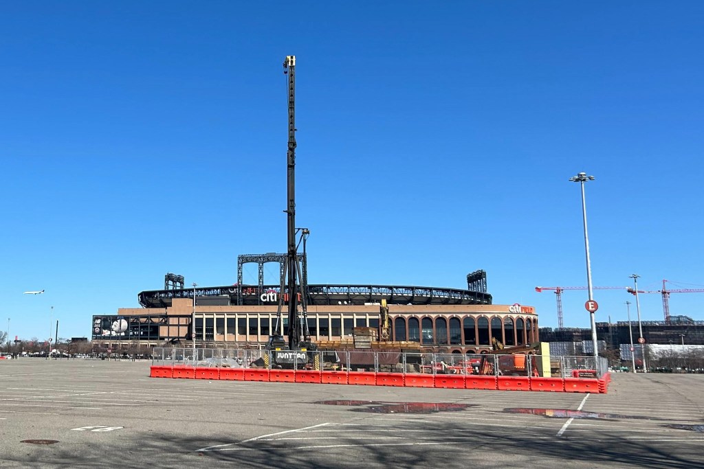 A construction crew uses a boring machine in the Citi Field parking as part of Steve Cohen’s casino project.