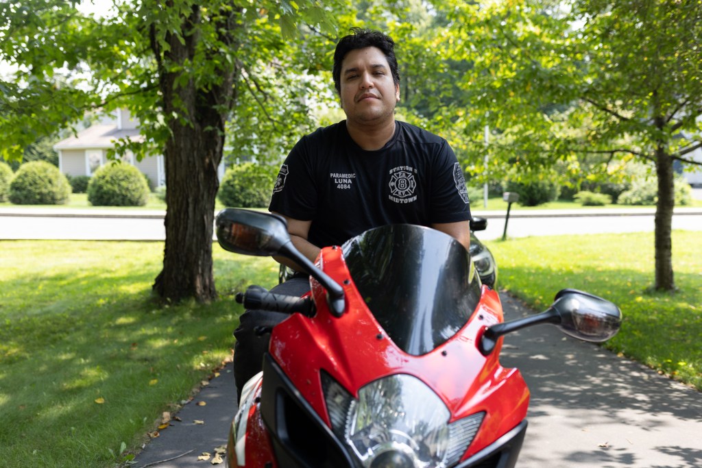 FDNY Paramedic Winslow Luna sits on his motorcycle in East Stroudsburg, PA.