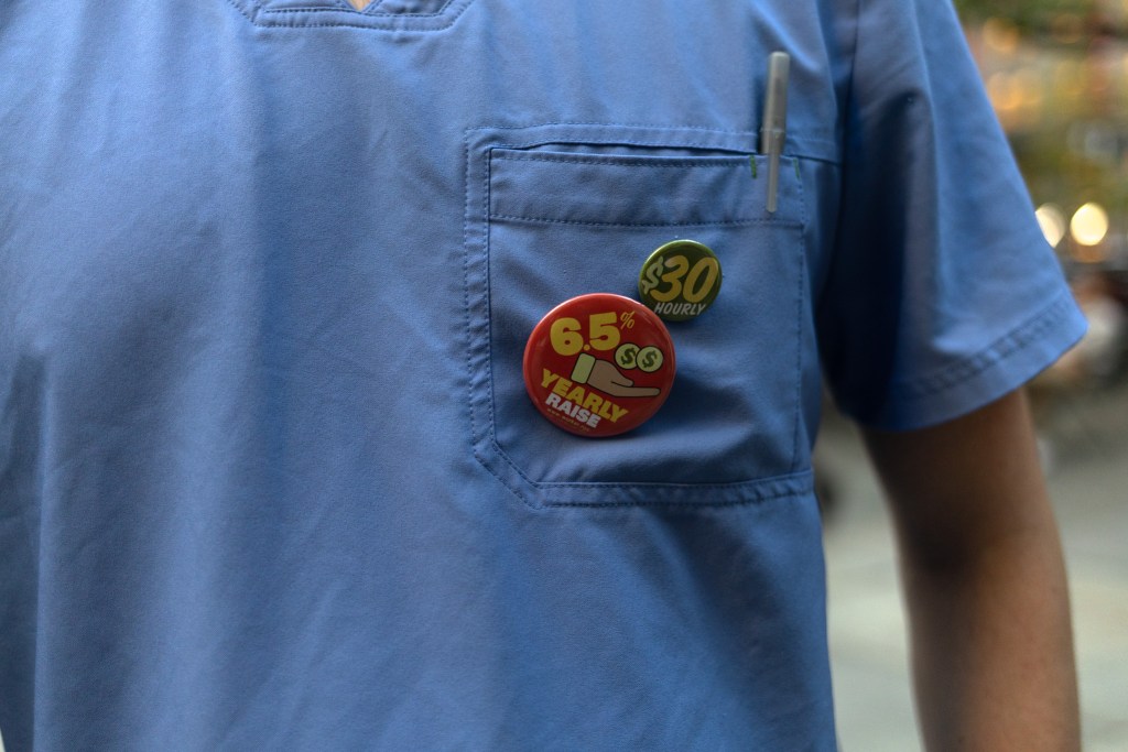 A DC 37 worker shows support for tough negotiations with the city,