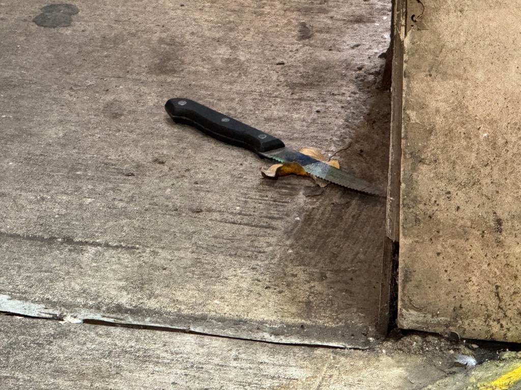 A knife recovered at the crime scene in a subway station where a passenger was stabbed.