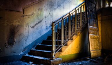 The Ghost House: interior of an abandoned house, very dirty and messy, with rotten walls and staircases.
