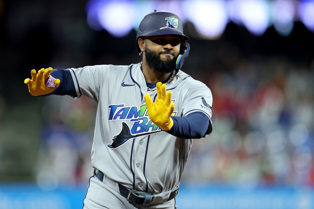 Junior Caminero of the Tampa Bay Rays celebrates after hitting a home run.