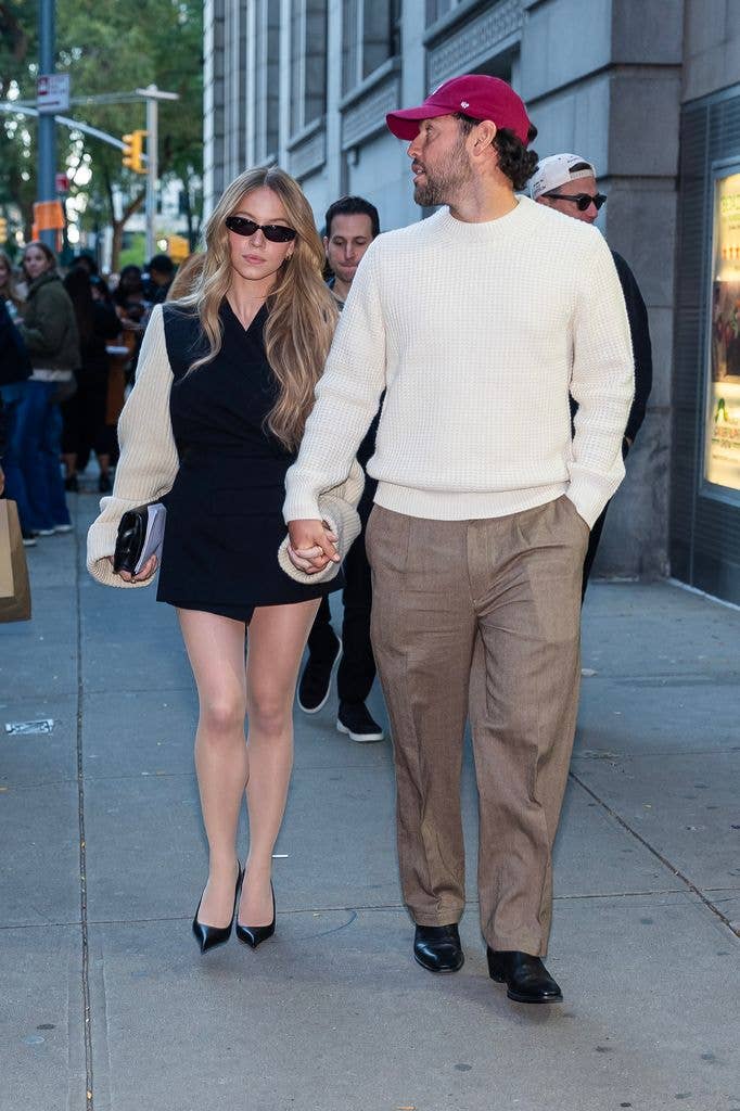 Sydney Sweeney (L) and Scooter Braun are seen in Union Square on October 18, 2026 in New York City