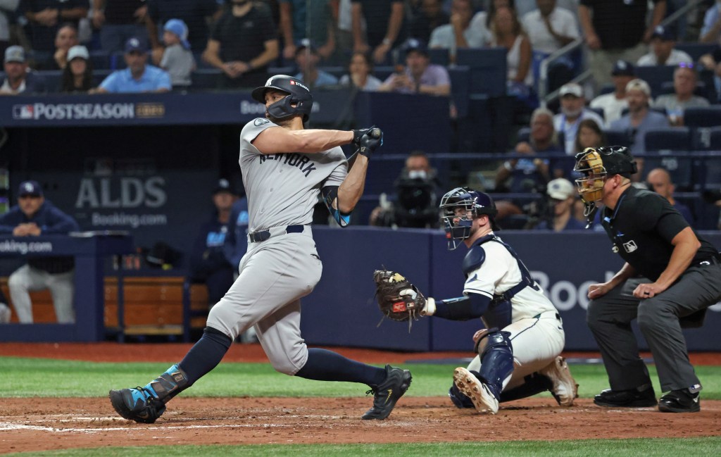 Yankees pinch-hitter Giancarlo Stanton strikes out swinging during the ninth inning of Game 1 of the ALDS against the Tampa Bay Rays at Tropicana Field, Saturday, October 3, 2026. The Tampa Bay Rays defeated the New York Yankees to take Game 1 of the ALDS.
