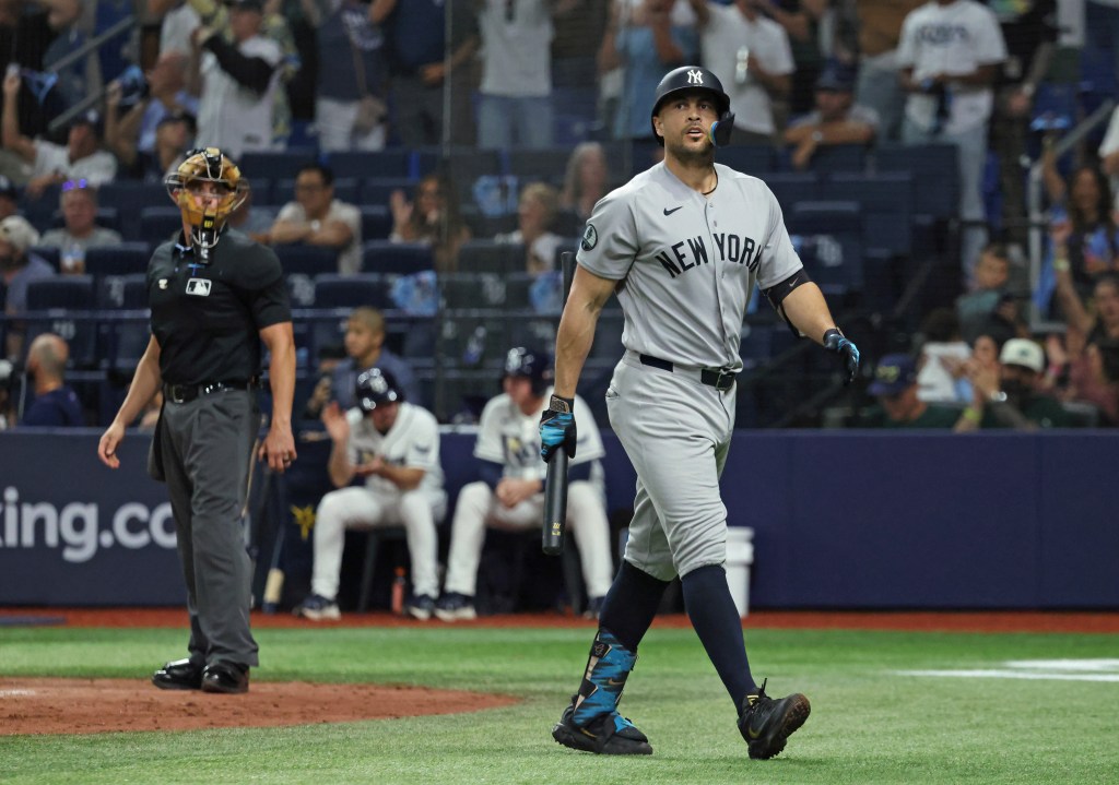 Yankees pinch-hitter Giancarlo Stanton reacts after striking out swinging during the ninth inning of Game 1 of the ALDS against the Tampa Bay Rays at Tropicana Field, Saturday, October 3, 2026. The Tampa Bay Rays defeated the New York Yankees to take Game 1 of the ALDS.