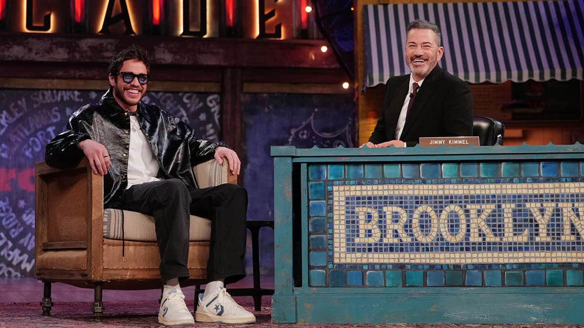 Pete Davidson and Jimmy Kimmel seated together on the set of Jimmy Kimmel Live!