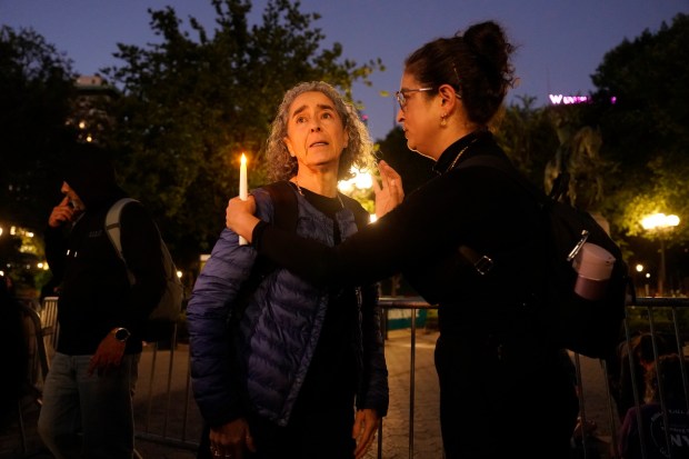 People attend a prayer vigil in which pro-Palestinian protesters and pro-Israel protesters faced-off in Manhattan's Union Square on Oct. 7, 2026, on the third anniversary of Hamas' October 7th attack in Israel. (Barry Williams / New York Daily News)