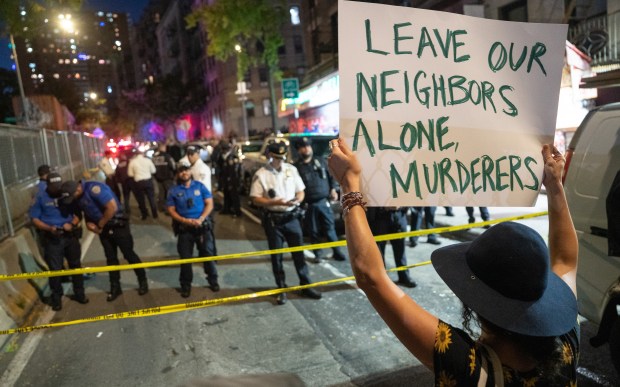 Protestors gather after ICE agents shot and wounded a man on Marble Hill Ave. near W. 225th St. on Thursday, Oct. 8, 2026 in the Bronx. (Barry Williams/ New York Daily News)