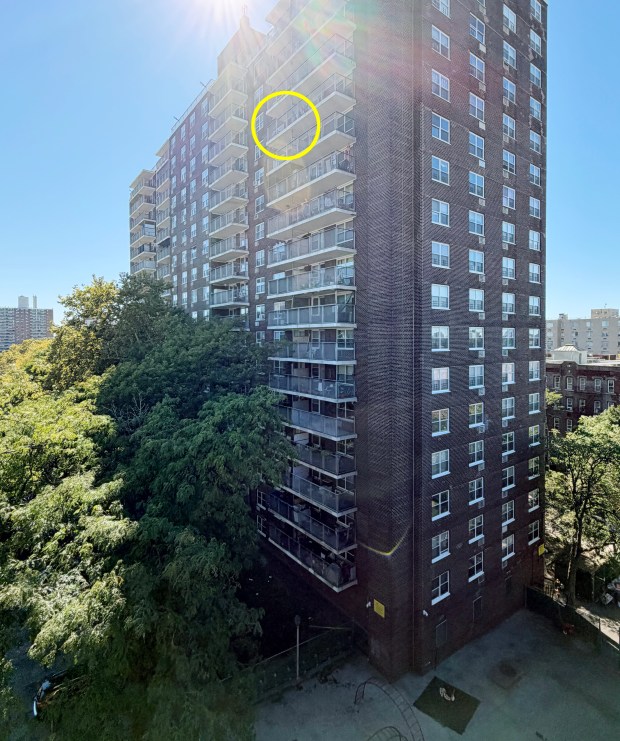 A 23-year-old woman was killed and a baby girl was critically hurt in a plunge from a 15th-floor balcony (circled) in an apartment building on Olinville Ave. in the Bronx early Tuesday, Oct. 6, 2026.
