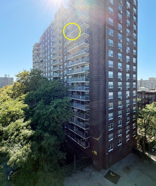 A 23-year-old woman was killed and a baby girl was critically hurt in a plunge from a 15th-floor balcony (circled) in an apartment building on Olinville Ave. in the Bronx early Tuesday, Oct. 6, 2026.