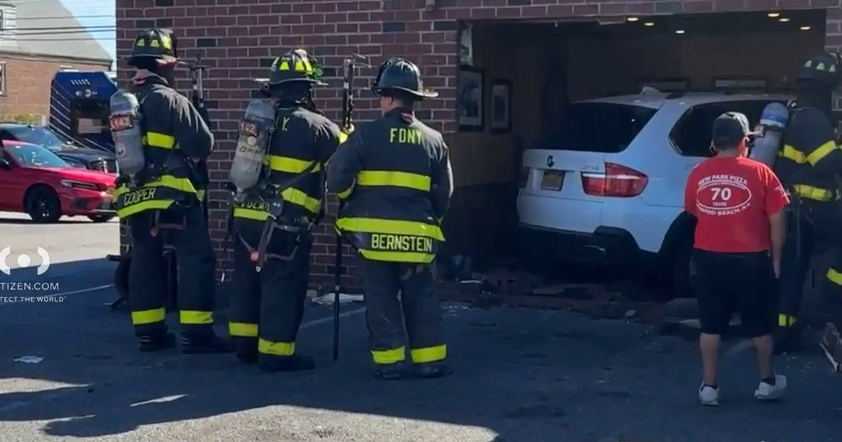 Car crashes into Queens pizzeria; 2 injured, FDNY says