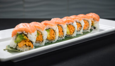 Salmon-topped sushi roll platter at Noribar kosher sushi restaurant