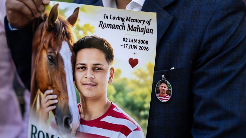 Gaurav Mahajan, uncle of Romanch Mahajan, holds a poster during a press conference ahead of the vote to ban horse carriages in Central Park, Thursday, Oct. 22, 2026, in New York. (AP Photo/Yuki Iwamura)