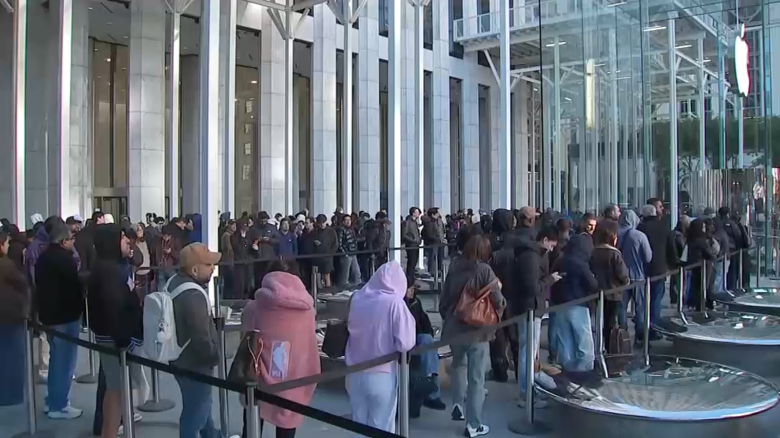 Lines wrap around Apple flagship store on Fifth Avenue in Midtown for new iPhone Duo release