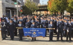 Perennial parade participants pose for a commemorative group photo: the Aviation HS Air Force JROTC.